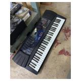 Casio LK-33 61-key electronic keyboard with a key