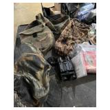 Camouflage pouch with black powder tools ,