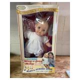 Sing-along baby doll original box.