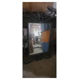 Wrought iron framed wall mirror 29x40 over all