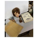 Elite guest book, trophy, model viola head,