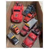 Harley Davidson and other die-cast toy tow trucks