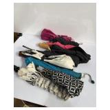 Assortment of umbrellas, black, white, pink and