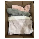 Assortment of large towels, different colors