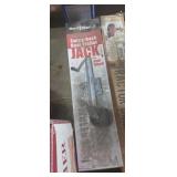 Swing back boat trailer jack
