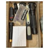 Mix of new and used flashlights and flashlight