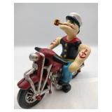 Modern cast iron Popeye on motorcycle