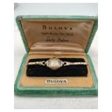 Lady Bulova watch in original box marked gold 10k