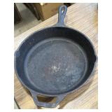 Lodge cast iron skillet with dual pour spouts &