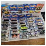 37 hotwheels and matchbox cars in packages 1 out