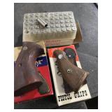 Collection of pistol grips and box of 38 special