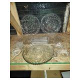 Group of glass serving trays and bowls.