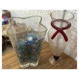 Wavy glass vase with stones and red accented