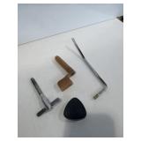 Wahmmy bar, guitar string winder, pick holder &