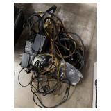 Assortment of power cables, av cords, laptop