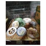 Group of assorted ceramic and glass plates and