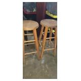 Two matching wooden stools
