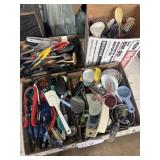 Assorted kitchen utensils, measuring cups,