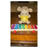 Old fisher price toy, and super old bear.