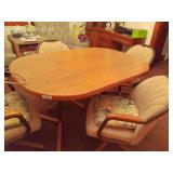 Dining Table w/ 4 new Rolling Chairs