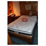 Adjustable Full Bed With a Maple Frame
