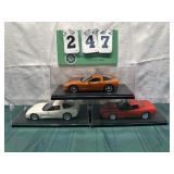(3) Assorted Corvette Cars In Display Cases Lot 25