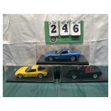 (3) Assorted Corvette Cars In Display Cases Lot 24