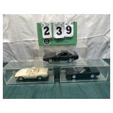 (3) Assorted Corvette Cars In Display Cases Lot 17
