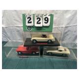 (3) Assorted Corvette Cars In Display Cases Lot 7