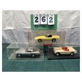 (3) Assorted Corvette Cars In Display Cases Lot 40