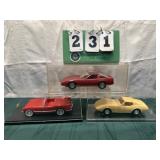 (3) Assorted Corvette Cars In Display Cases Lot 9