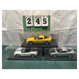 (3) Assorted Corvette Cars In Display Cases Lot 23
