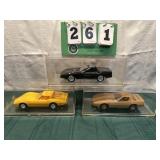 (3) Assorted Corvette Cars In Display Cases Lot 39