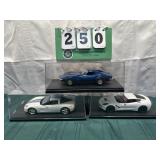 (3) Assorted Corvette Cars In Display Cases Lot 28