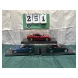 (3) Assorted Corvette Cars In Display Cases Lot 29