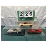 (3) Assorted Corvette Cars In Display Cases Lot 4