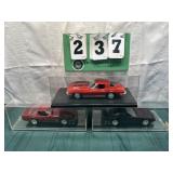 (3) Assorted Corvette Cars In Display Cases Lot 15