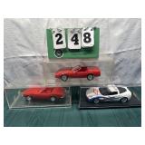 (3) Assorted Corvette Cars In Display Cases Lot 26