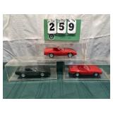 (3) Assorted Corvette Cars In Display Cases Lot 37