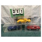 (3) Assorted PROMO Corvette Cars In Cases Lot 16