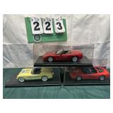 (3) Assorted PROMO Corvette Cars In Cases Lot 28