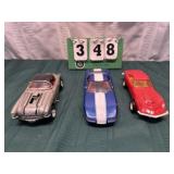 (3) Assorted Promo Corvette Cars In Cases Lot 9