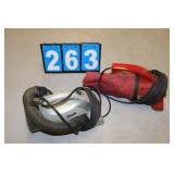 Two Handheld Vacuums