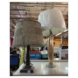 2 decorative table lamps with shades. One is