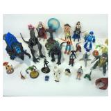 Assorted action figures and more. Goofy, alien