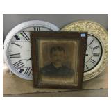 Framed Portrait and 2 Large wall hanging clocks.
