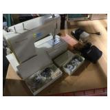 Kenmore Sewing Machine and accessories. Untested.