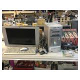 HP PC, Monitor, Keyboard, Mouse, and Model Car.