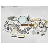 Costume jewelry, magnifying glass, watch and