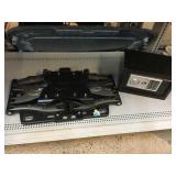 TV wall mount and Honeywell locking safe.